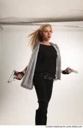 NIKOL ACTION STANDING POSE WITH GUNS